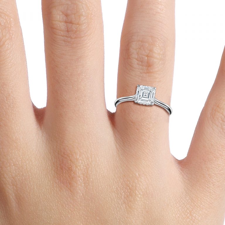 asscher cut engagement rings with hidden halo on hand