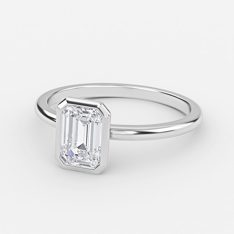 bezel set emerald cut diamonds ring