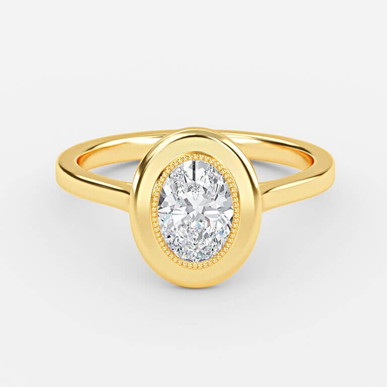 bezel set oval diamond yellow gold rings