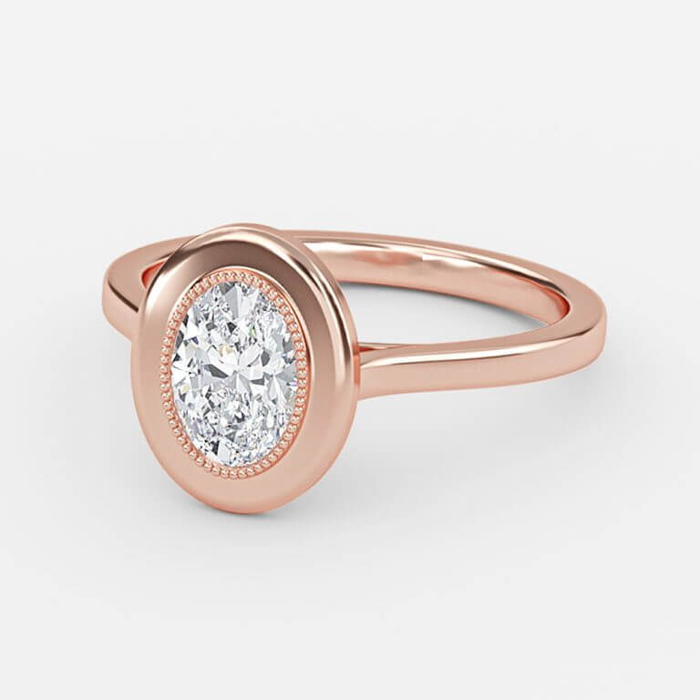 oval cut bezel set diamond engagement ring