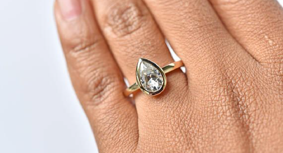 pear diamond bezel setting ring 